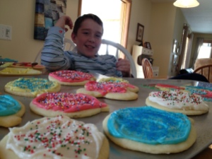 The tradition of frosting Christmas cut-outs with Joe.
