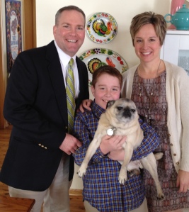 Wouldn't be a family photo without Earl the Pug!