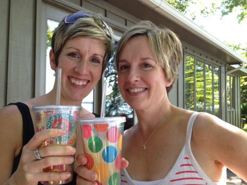 My sister and I, enjoying a beverage and the sunny weather.
